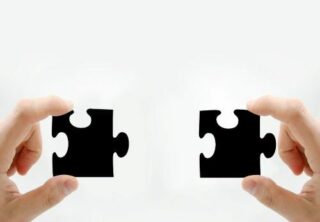Two pieces of a jigsaw